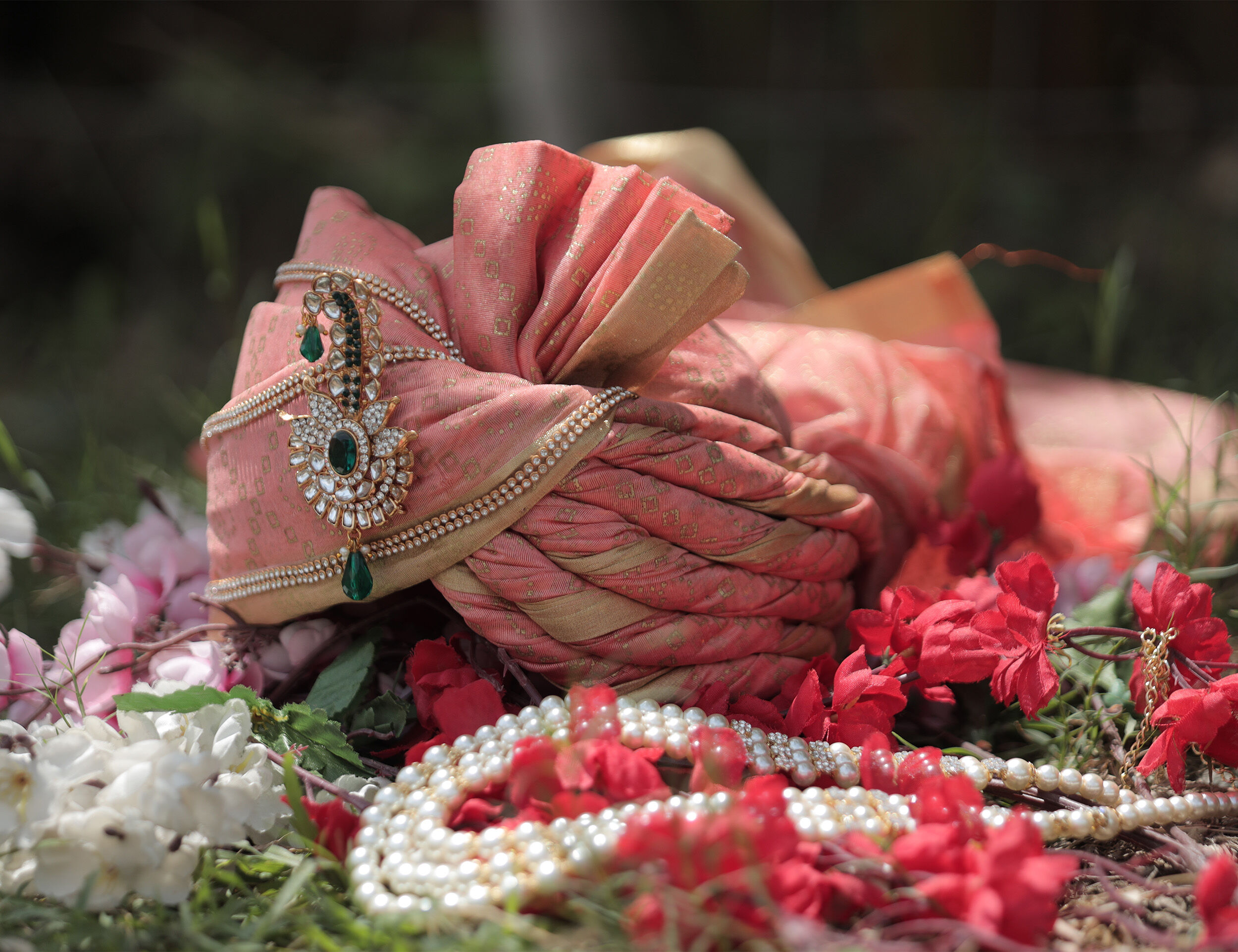  Red wedding safa with white mala and decorative red roses